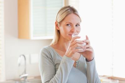 Woman taking vitamin Woman taking vitamin