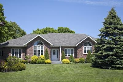 Brick homes in older suburban neighborhoods reflect a conservative choice in brick and roof colors.