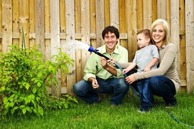Take caution when watering plants near a fence