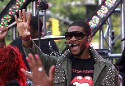 Usher performing on stage