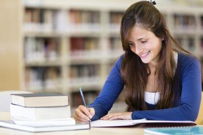 college student studying in library