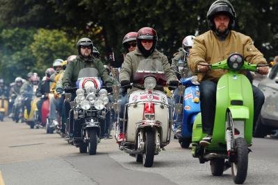 Scooter riders at festival