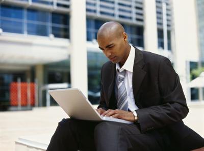 Man typing on laptop