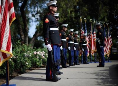 Marine Corps Battalion perform 21 gun salute