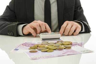 You can buy gold coins in person from a dealer.