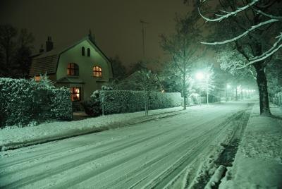 Take photos of the icy or wet road at the intersection where you received the ticket.