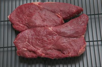 Place the seasoned steaks on a broiler pan and place the pan under the boiler element.