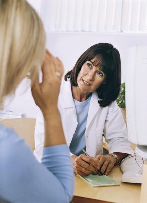 Woman meeting with her doctor