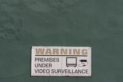 Surveillance cameras warning sign