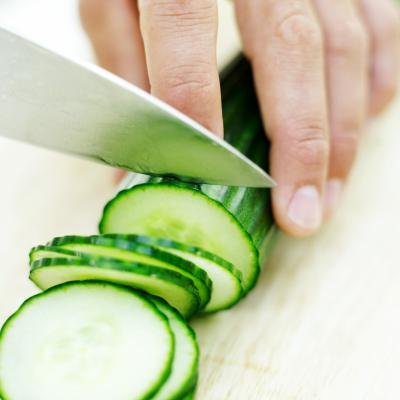 Cucumber being sliced