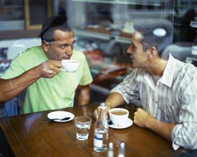 Men talking over coffee
