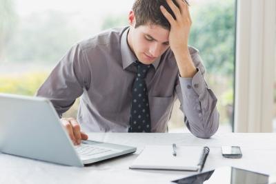 Man under stress at work