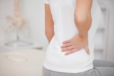 Acid reflux pain may radiate to the back.