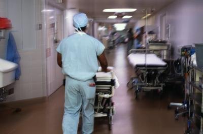 Hospital transporter in hallway