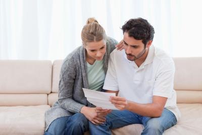 Couple reading about benefits