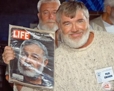 Life magazine from 1961 featuring Ernest Hemingway, held by a look alike contestant Life magazine from 1961 featuring Ernest Hemingway, held by a look alike contestant