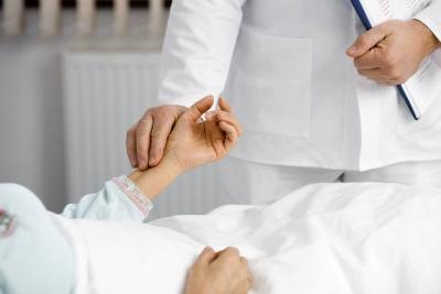 Checking a pulse.