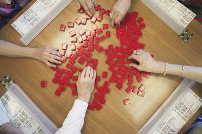 people picking tiles for Mahjong