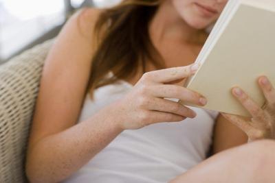 Woman holding book
