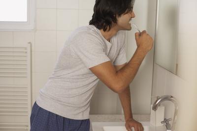 Man brushing teeth