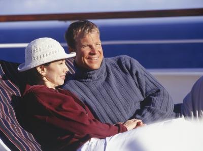 A couple enjoys the view in lounge chairs.