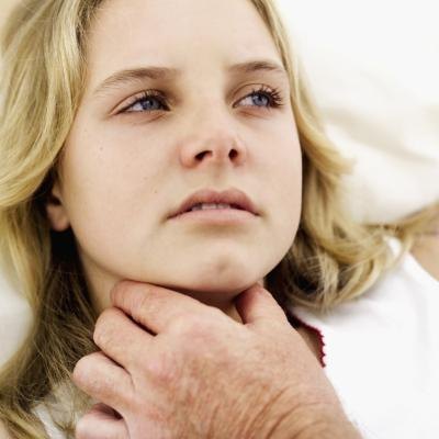 Because the lymph nodes in the neck are swollen, you may experience trouble breathing, coughing, or even chest pains.