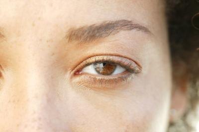 A close-up of the area around a woman's eye.