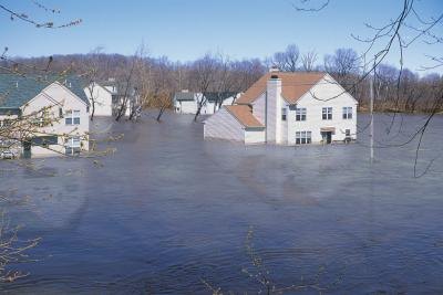 In the case of an apartment being a total loss after a flood, the lease becomes effectively terminated automatically.