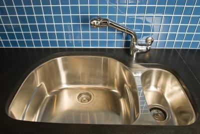 Blue tile is an easy-clean choice for sink areas.