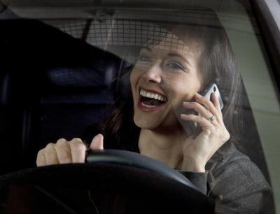 Driving while on the phone presents many dangers. Driving while on the phone presents many dangers.