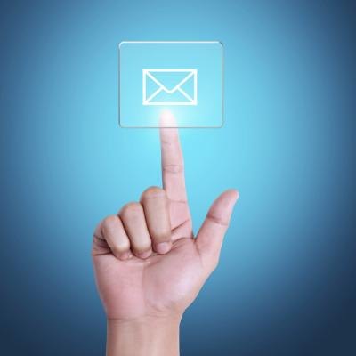 Hand pressing email button.