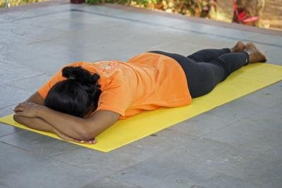 Start by laying on your stomach