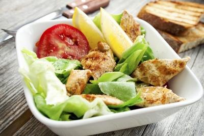 A salad with grilled chicken.