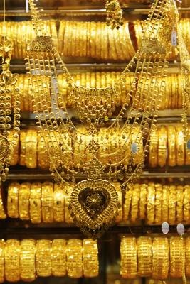 Don't be intimidated by necklaces. If there are charms and elements you can use from a necklace, take it apart with some heavy duty scissors.