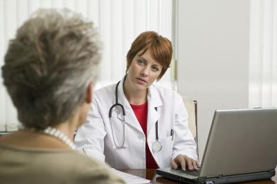 Woman talking with doctor