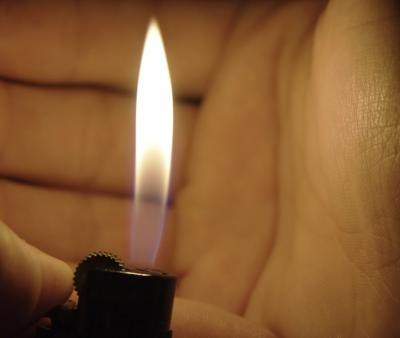 Use a butane lighter with a long handle, and never turn on the gas flow to the gas starter before igniting the lighter.