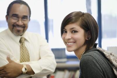 Probation officer beside teenage girl