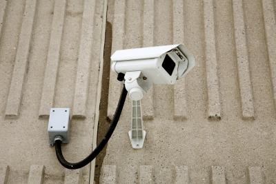 Surveillance camera on wall