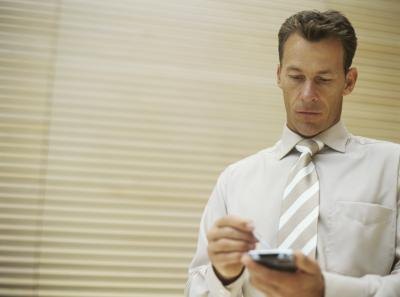 Man writing on tablet