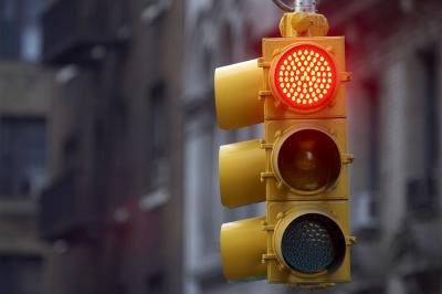 Create doubt that you entered the intersection after the light turned red.