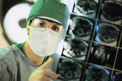 Doctor looking at brain scan