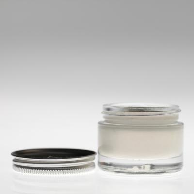 Jar of topical cream.