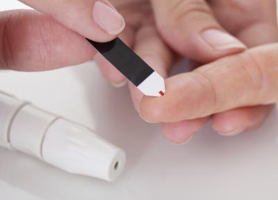 Diabetic getting a blood sugar test