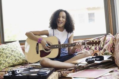 Girl playing guitar