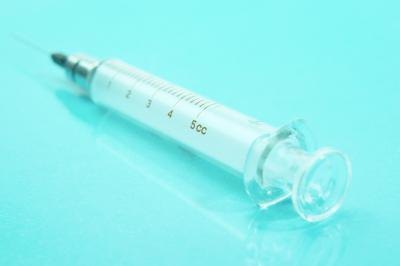 A bulb syringe with baking soda and water used properly can help relieve plugged ears.