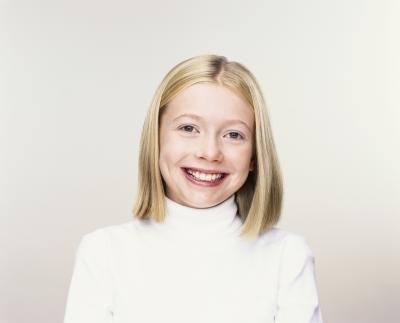 Young girl with a bob haircut. Young girl with a bob haircut.