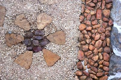 Pebbles arranged in a decorative arrangement.