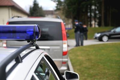 Look at the officer's car.