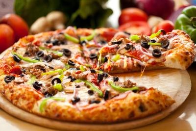 Pizza with many toppings Pizza with many toppings