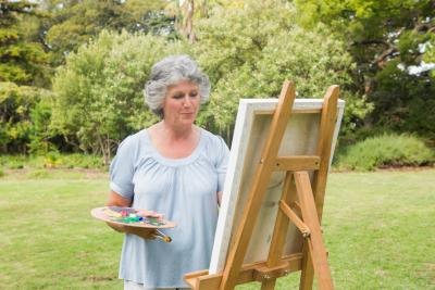 Painting a canvas.